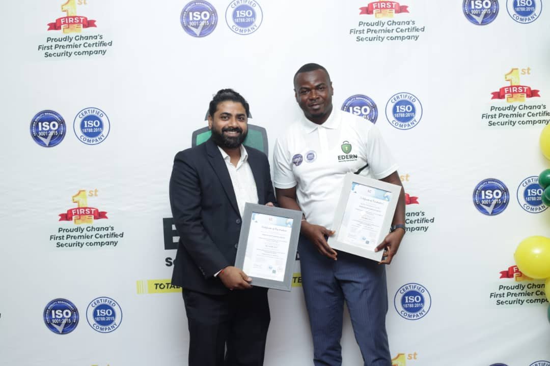 Mr Emmanuel Amoah Quartey (right) and ISO Auditor, Mr Mahesh Panigraphy (left) displaying the two ISO certifications during a ceremony at Holiday Inn Hotel in Accra on Friday, June 16, 2023